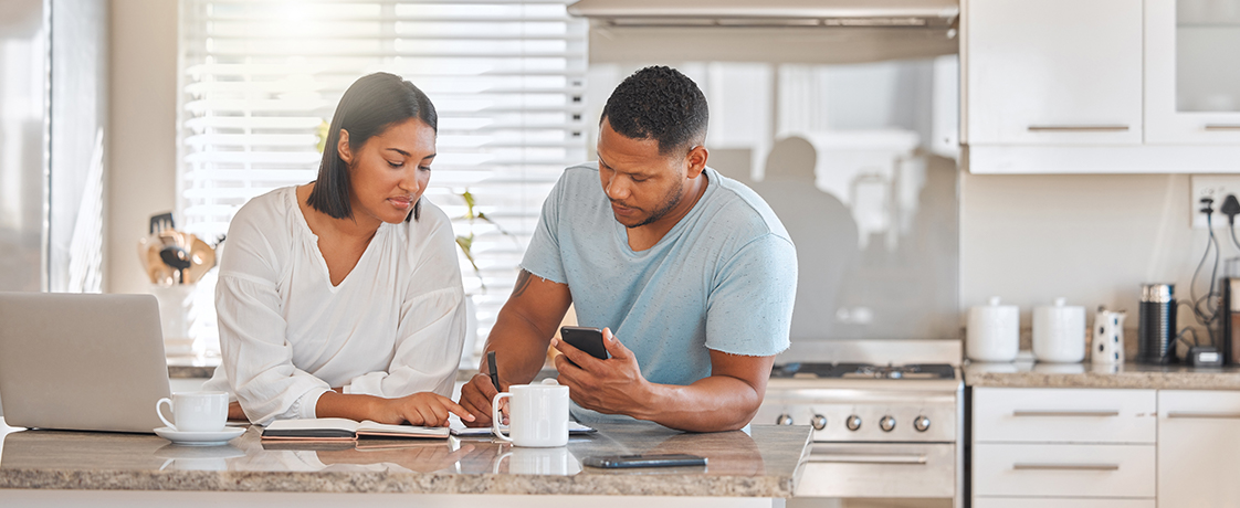 A couple at their kitchen counter
